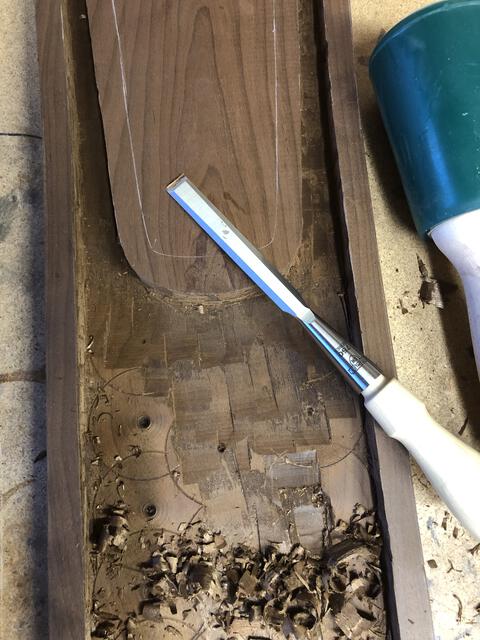 Chisel out all of the drilled holes. I've learned how important it is to have sharp chisels. These are sharper than the average razor blade.
